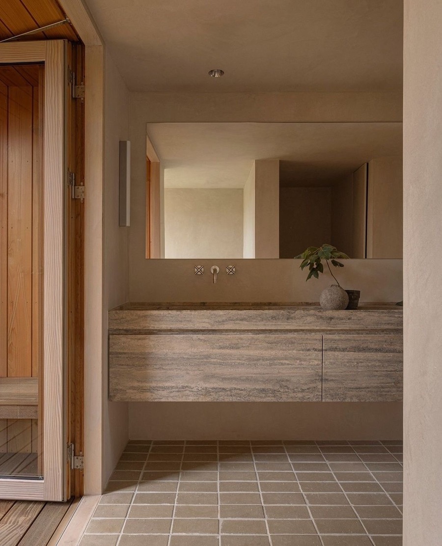 a japandi bathroom in brown and beige tones