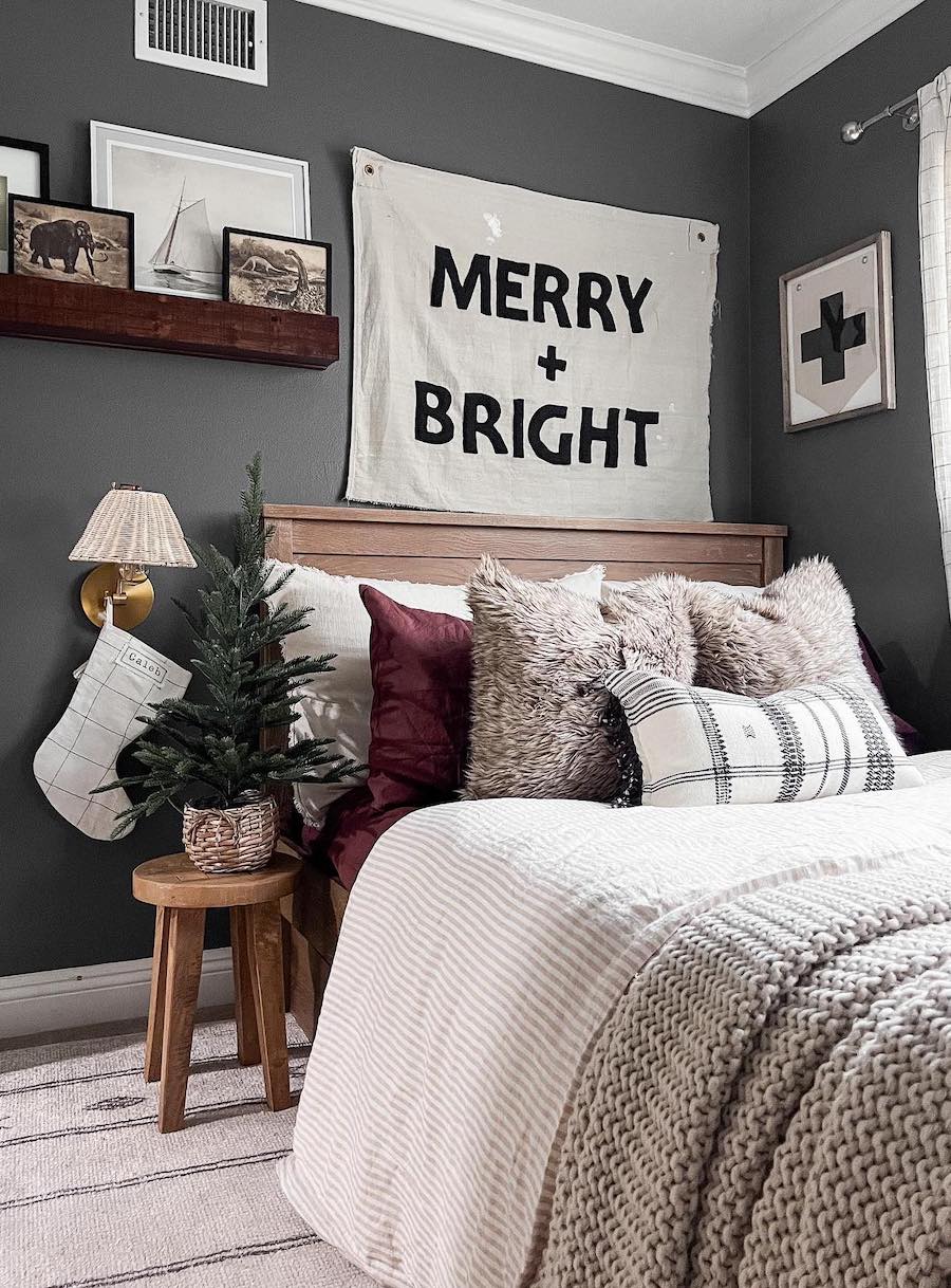 a bedroom with simple, warm winter decor