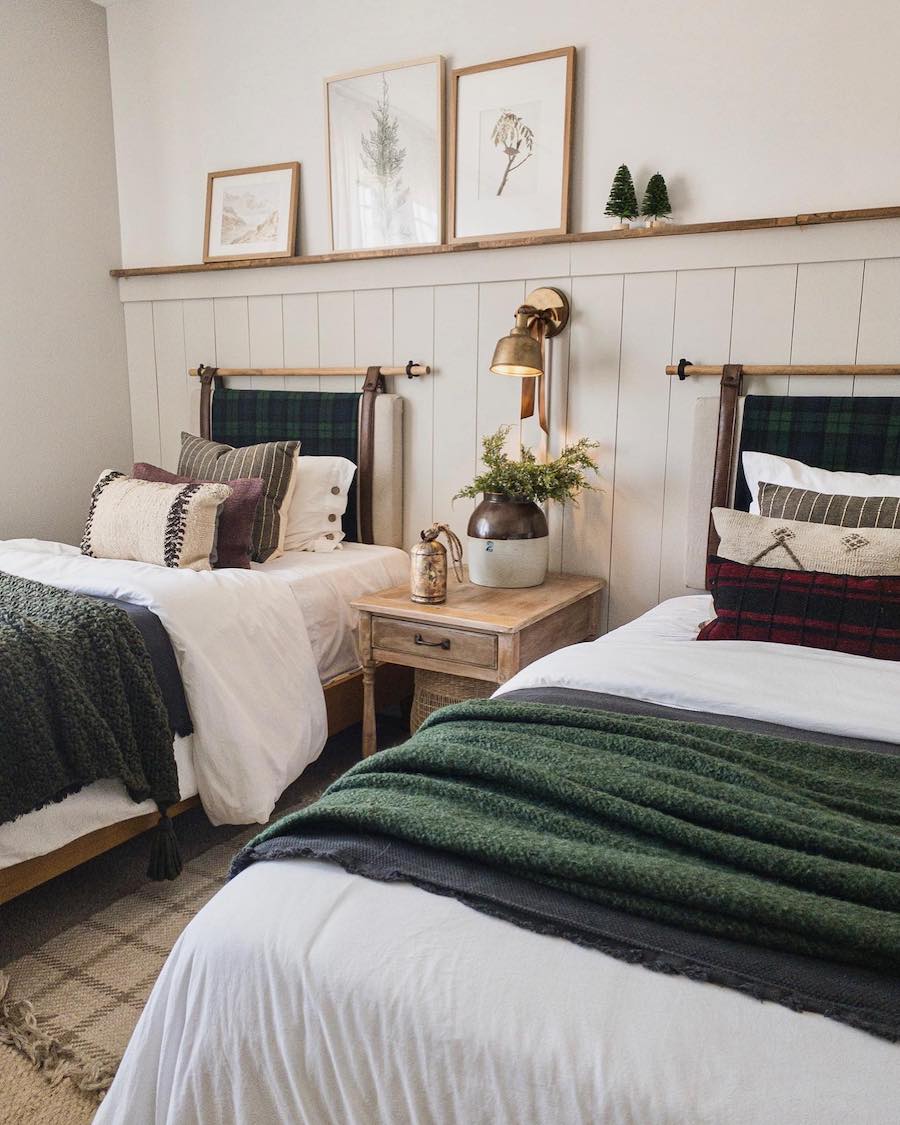 a bedroom featuring twin beds and holiday decor