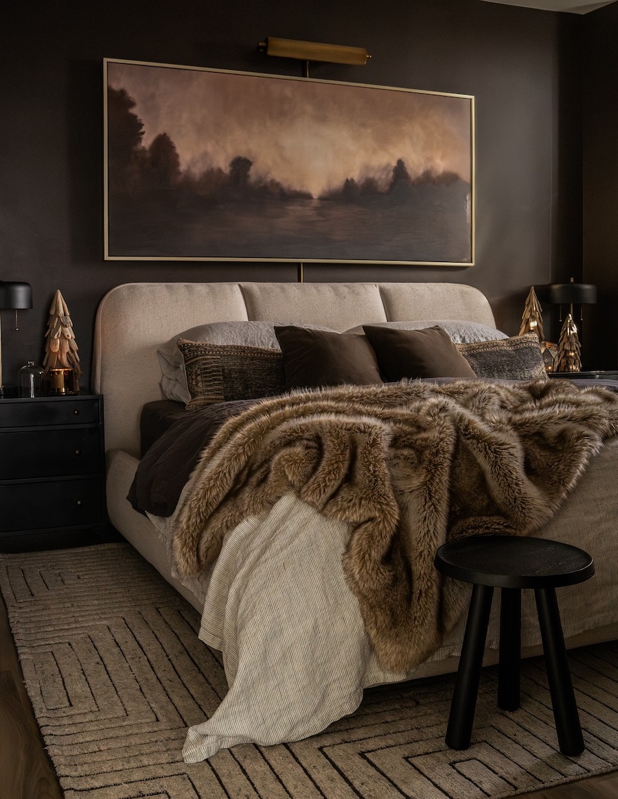 a moody bedroom with winter and holiday decor
