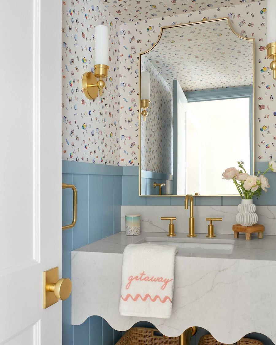 a bathroom with coastal decor