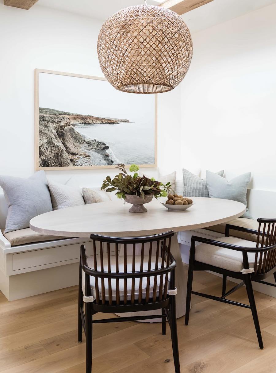 a dining table with coastal decor
