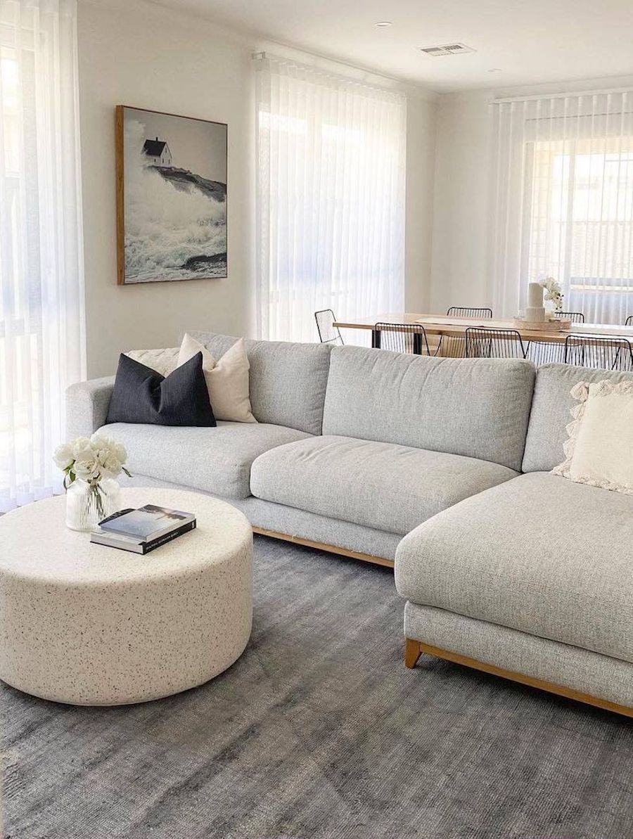 a grey, white, and navy coastal living room