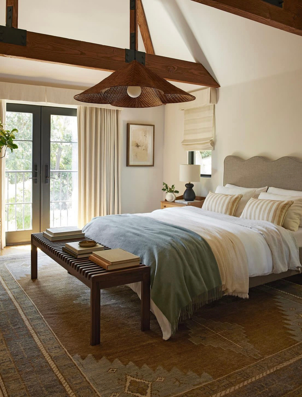 an earthy bedroom with boho flair and neutral tones