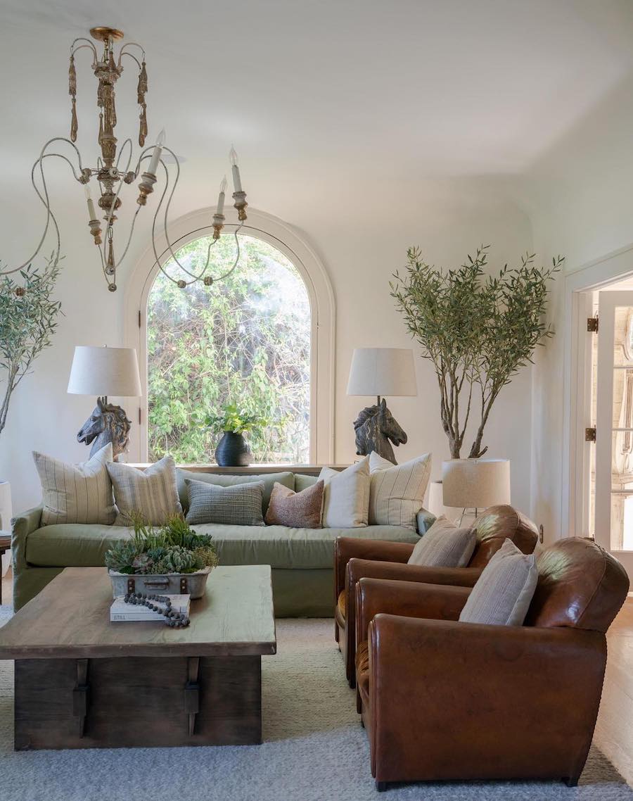 an earthy living room featuring neutral tones and eclectic decor