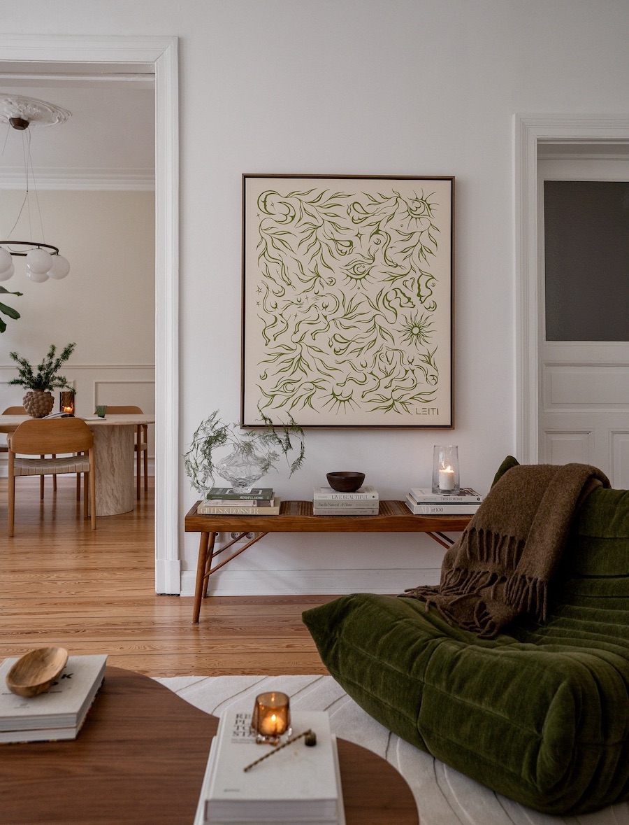 an earthy living room featuring eclectic decor and earth tones