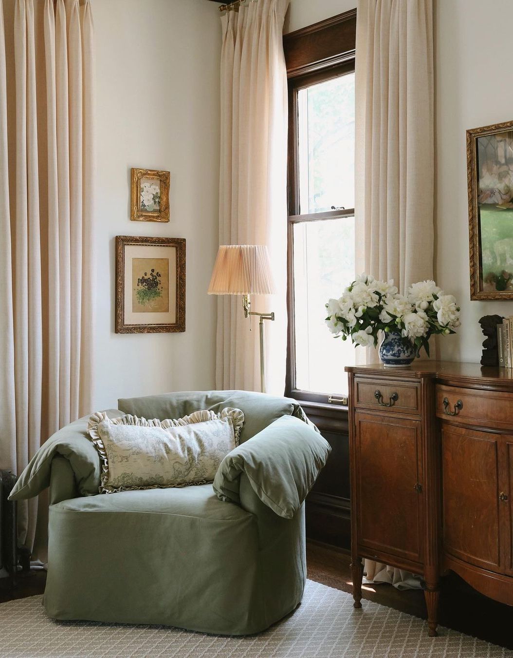 a french country living room featuring vintage decor