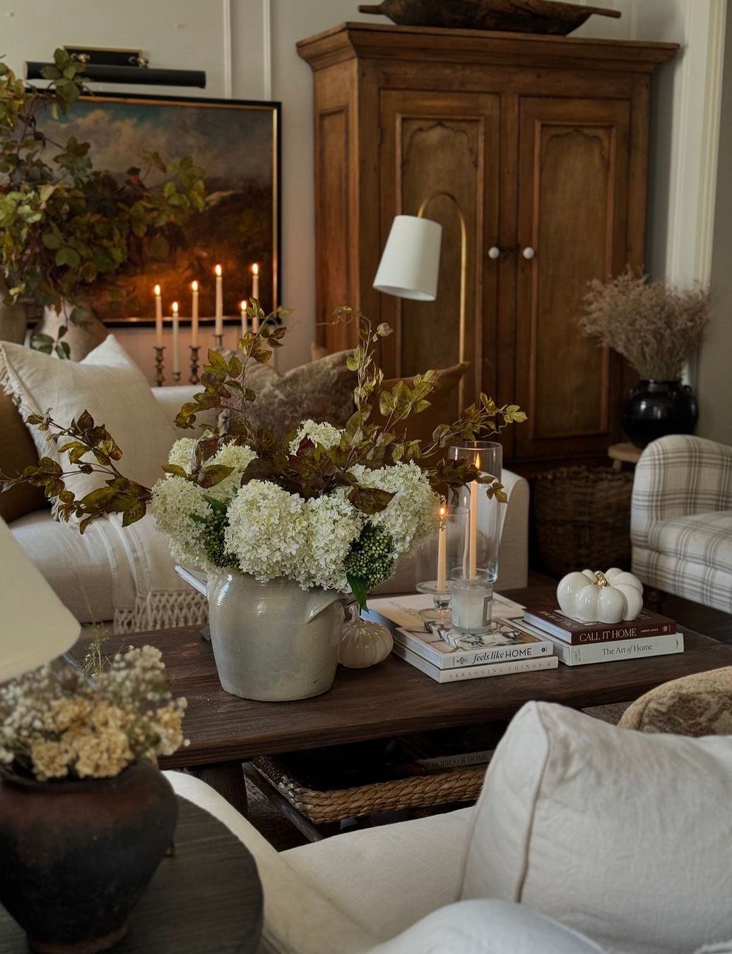 a living room featuring french country decor and neutral tones