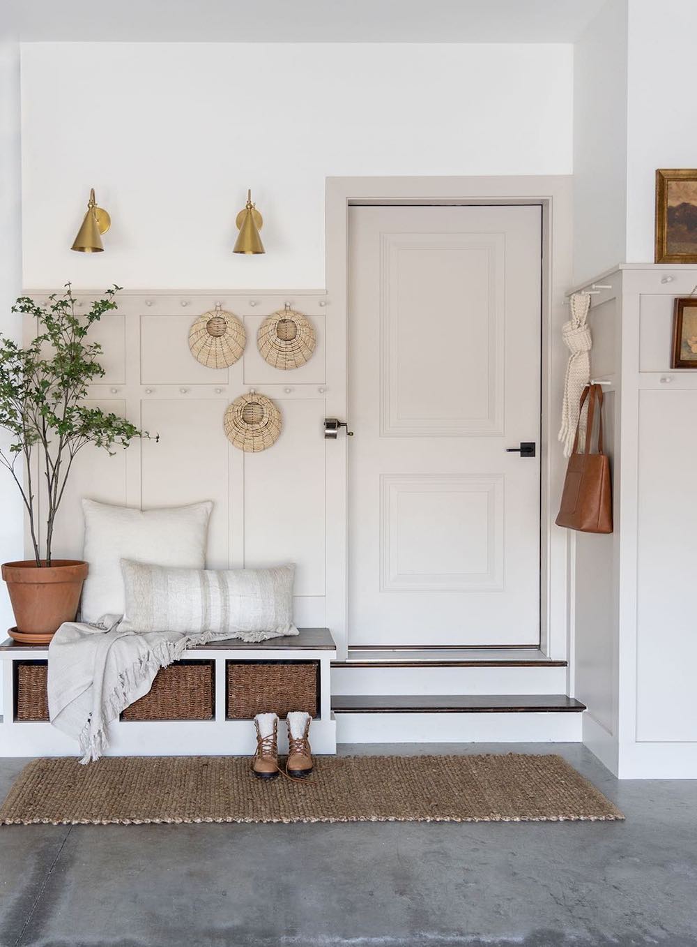 an organized garage featuring an entryway design
