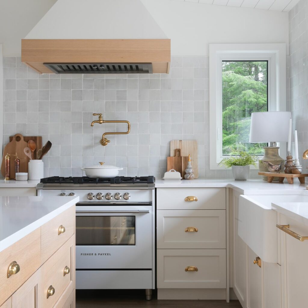 gold water faucet near stove