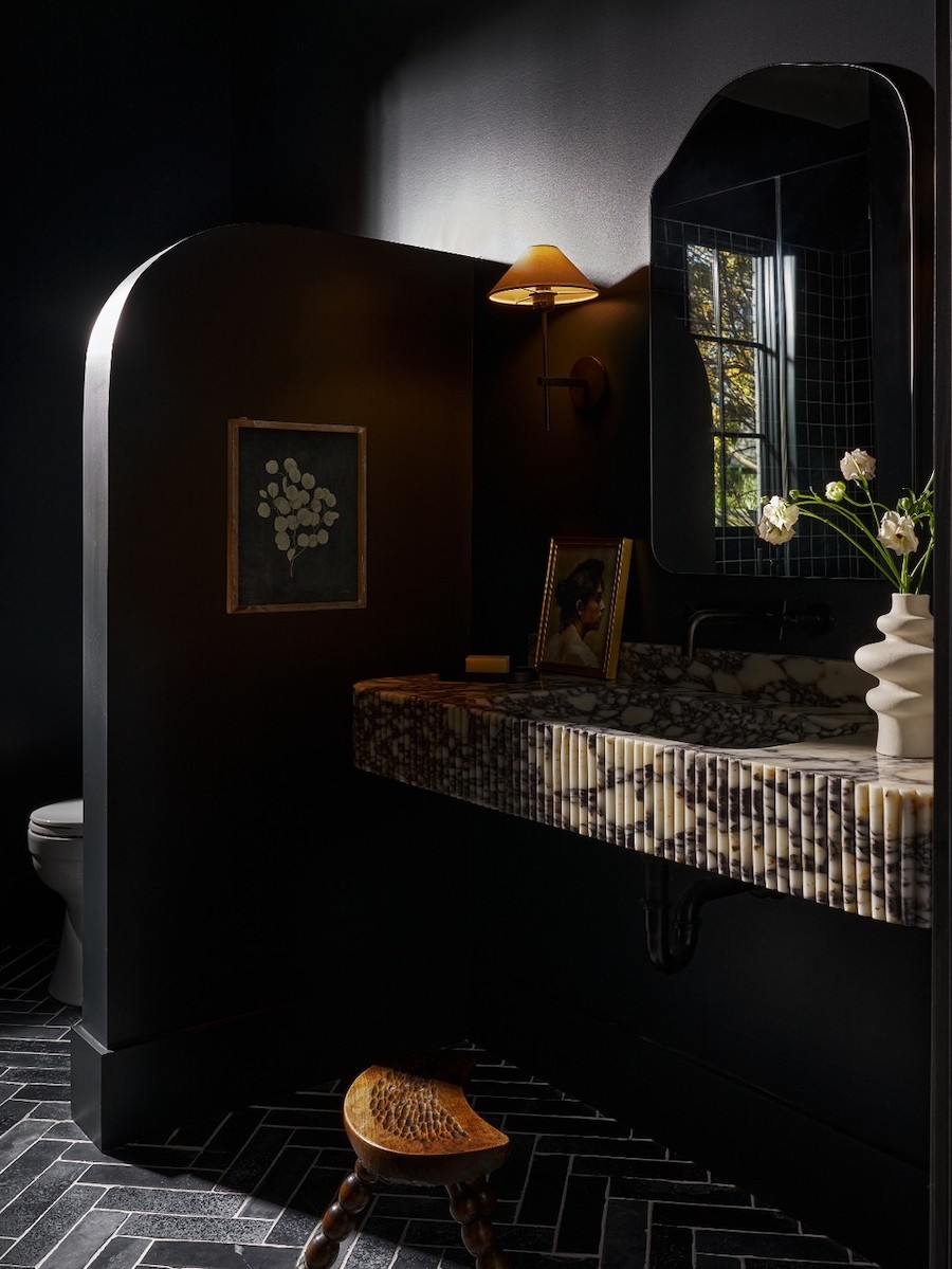 a dark and moody bathroom