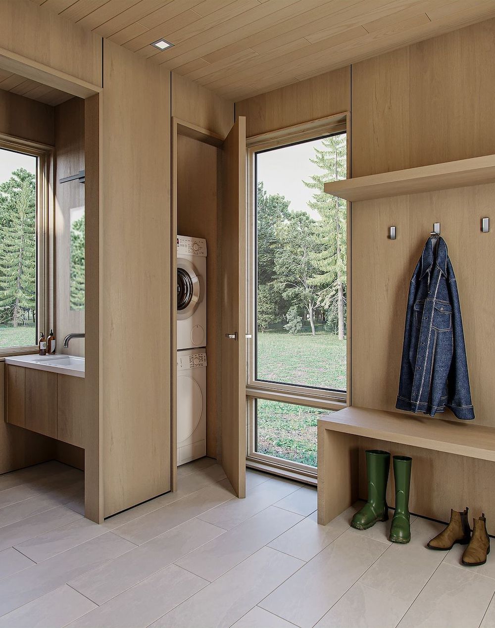a beige mudroom with a washer and dryer, bathroom, and storage for coats and shoes