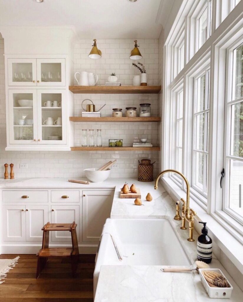 wooden shelving in white kitchen