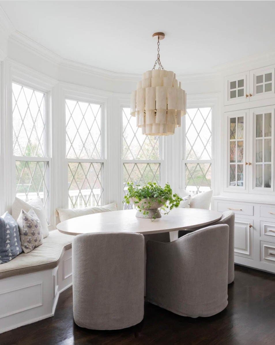 Use Rolling Arm Dining Chairs for Versatile Seating in a Kitchen Nook